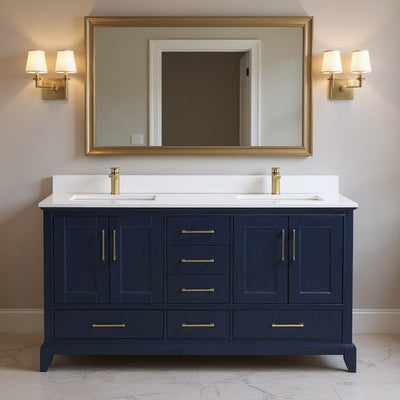 Bathroom vanity with blue cabinets, white countertop, and gold fixtures.