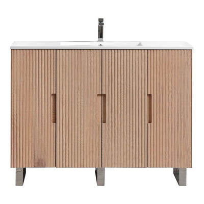 Wooden fluted bathroom vanity with white countertop on a white background
