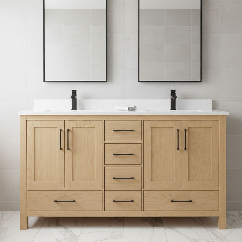 Bathroom vanity with wooden cabinets, white countertop, and black fixtures against a tiled wall.