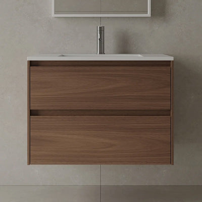 Wooden bathroom vanity in a walnut finish with a white acrylic sink top