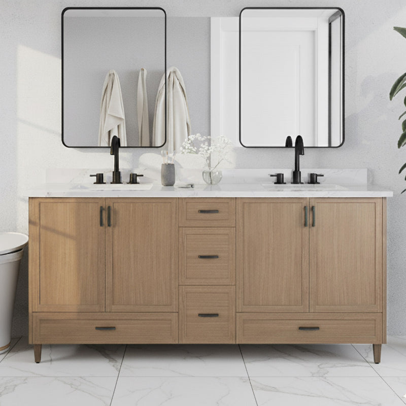 Bathroom vanity with wooden cabinets, white countertop, and black fixtures