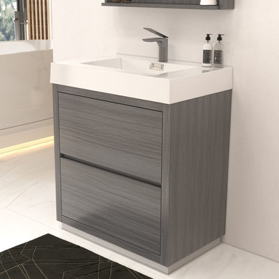 Bathroom vanity with gray cabinet and white countertop in a modern bathroom setting.