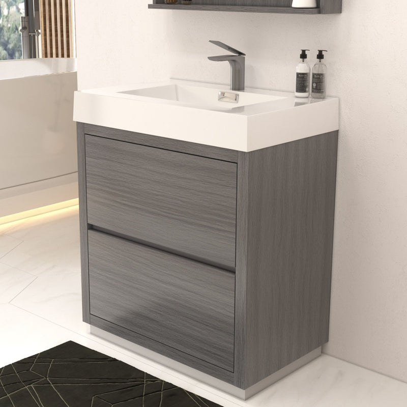 Bathroom vanity with gray cabinet and white countertop in a modern bathroom setting.